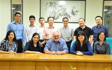 Lionel Barnard with former students in Singapore